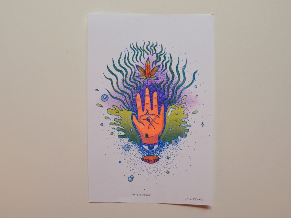Healing Hands print of an open palm with an eye, rising from green and pink flames