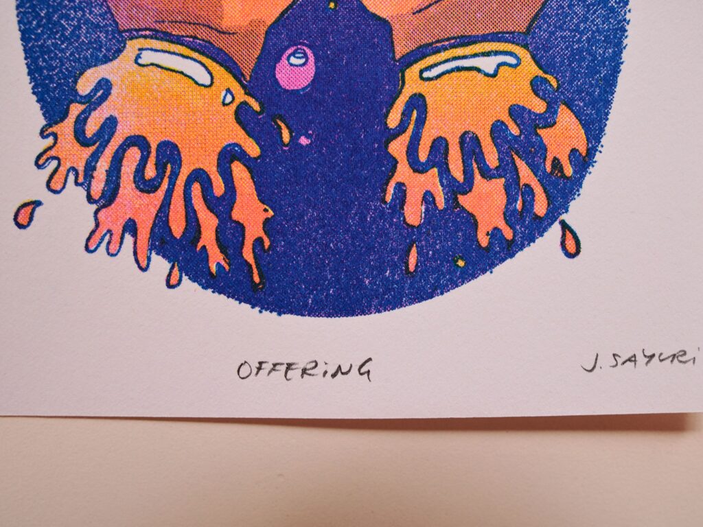 Close-up of a Healing Hands print showing dripping hands and the handwritten title