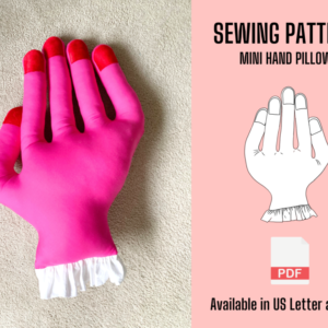 Mini Hand Pillow sewing pattern PDF: a pink mini hand pillow with red fingertips