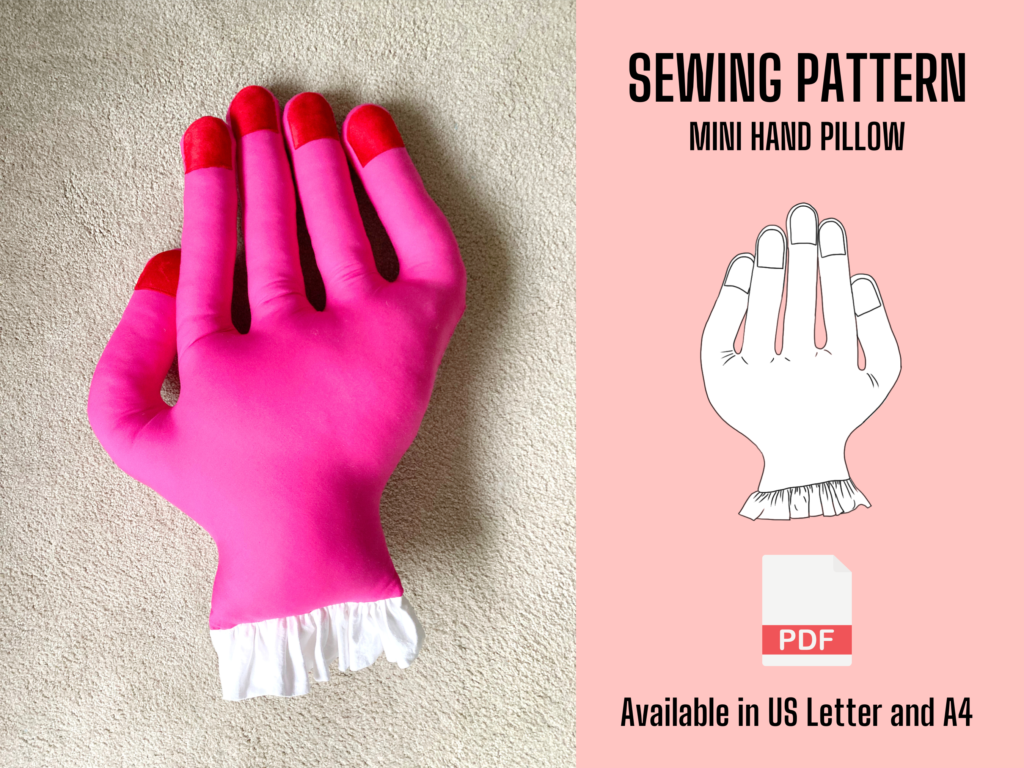 Mini Hand Pillow sewing pattern PDF: a pink mini hand pillow with red fingertips